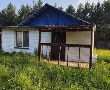Земельный участок в поселке Муранитный с баней и гаражом