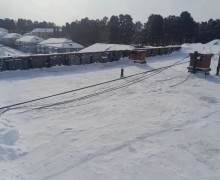В Заречном управляющая организация проводит очистку кровель и предупреждает об опасности схода снега