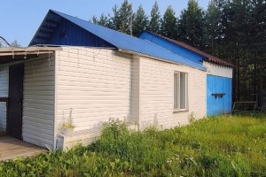 Земельный участок в поселке Муранитный с баней и гаражом