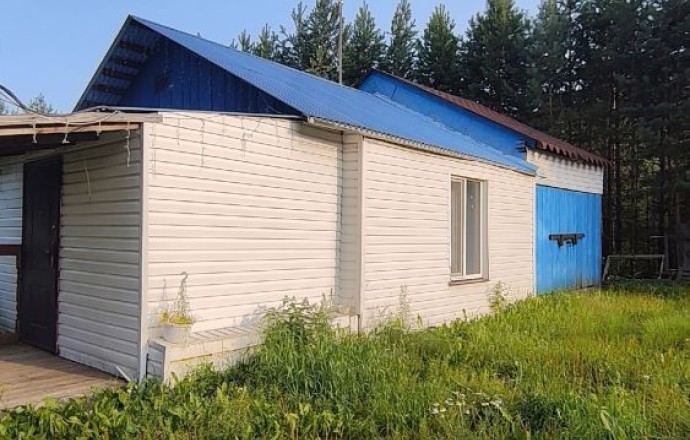 Земельный участок в поселке Муранитный с баней и гаражом