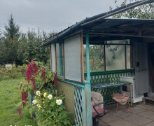 Садовый участок в СНТ «Кировский» с домиком и теплицами