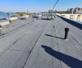 На Курчатова, 27/3 завершается капремонт кровли многоквартирного дома